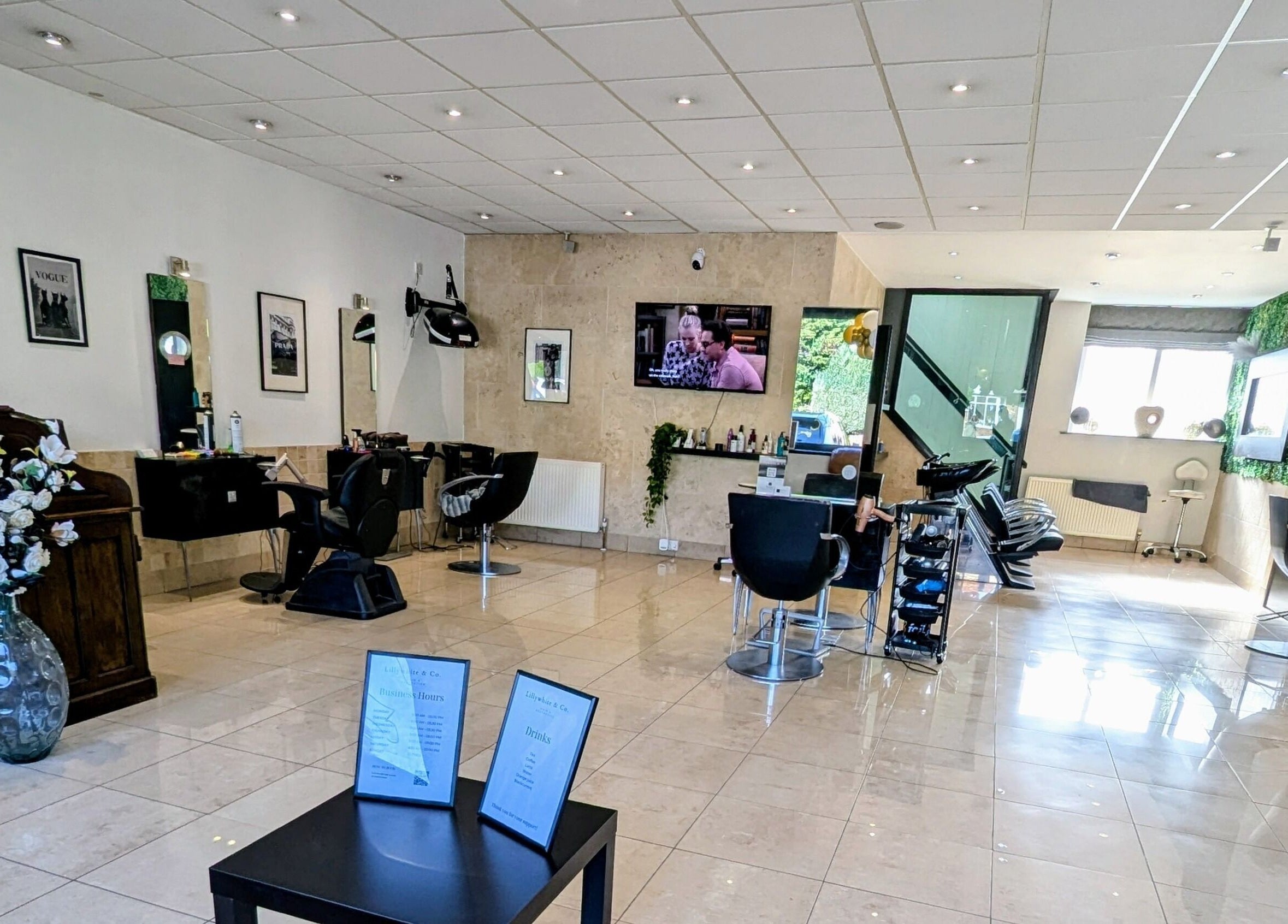 Beautiful salon interior of Bex at Lillywhite & Co. in Wakefield, England, GB showcasing modern decor and seating.