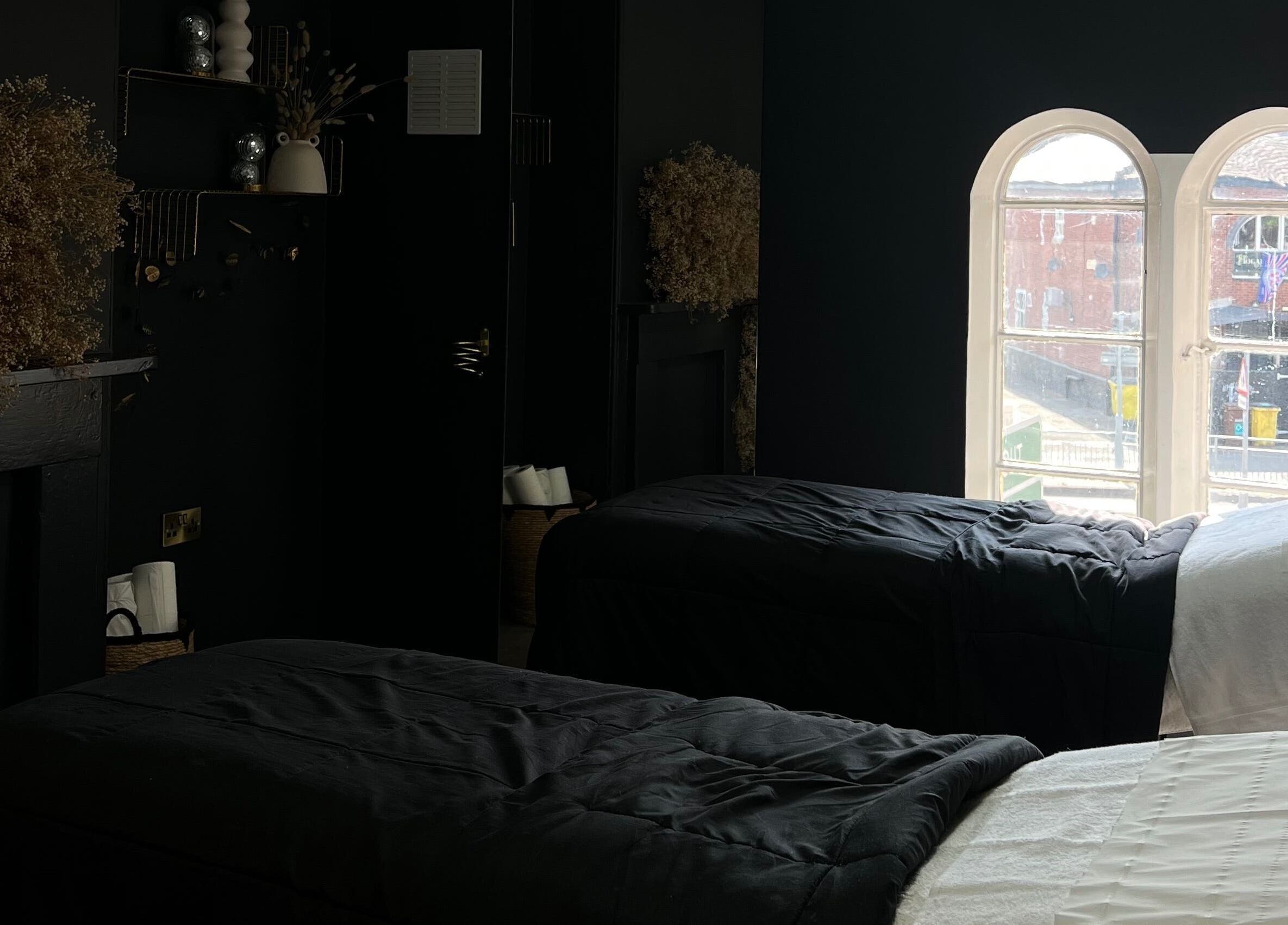 Cozy treatment room at beautybyella in Newcastle-under-lyme, England, GB with elegant decor and natural lighting.