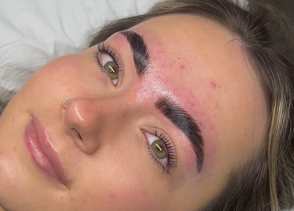 Client with freshly sculpted brows at beautybyella, Newcastle-under-lyme, England, GB showcasing glowing results.