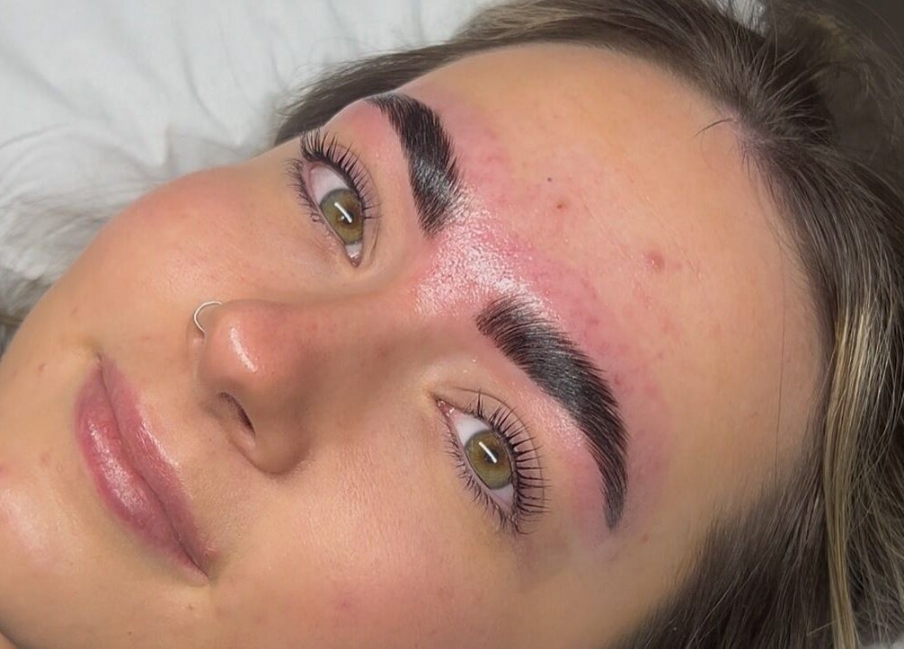 Client with freshly sculpted brows at beautybyella, Newcastle-under-lyme, England, GB showcasing glowing results.