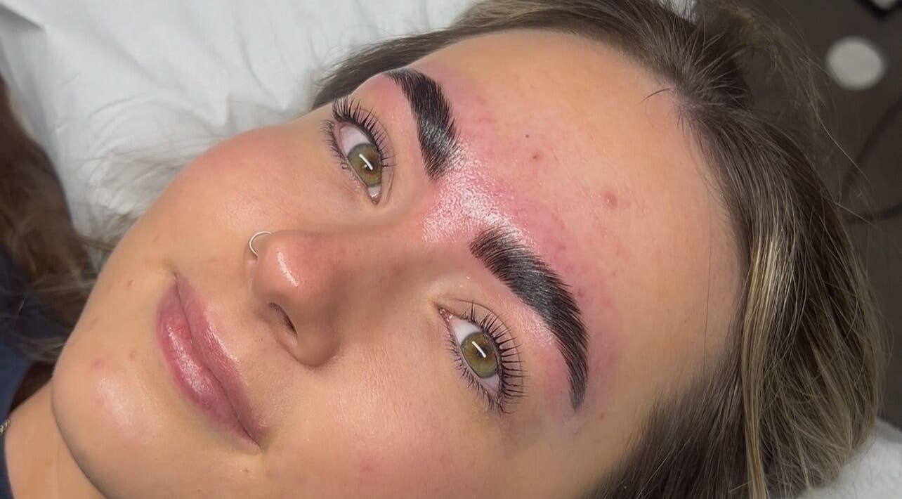 Client with freshly sculpted brows at beautybyella, Newcastle-under-lyme, England, GB showcasing glowing results.