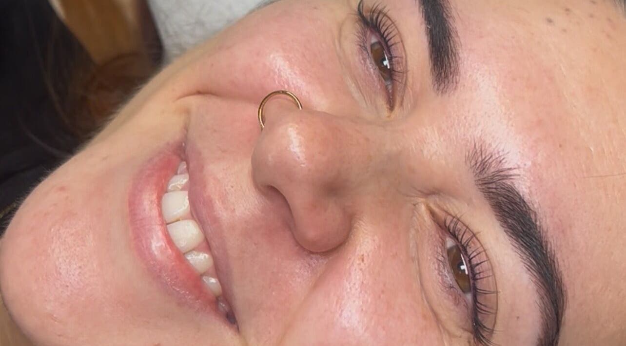 Smiling client after eyebrow treatment at beautybyella, Newcastle-under-lyme, England, GB.