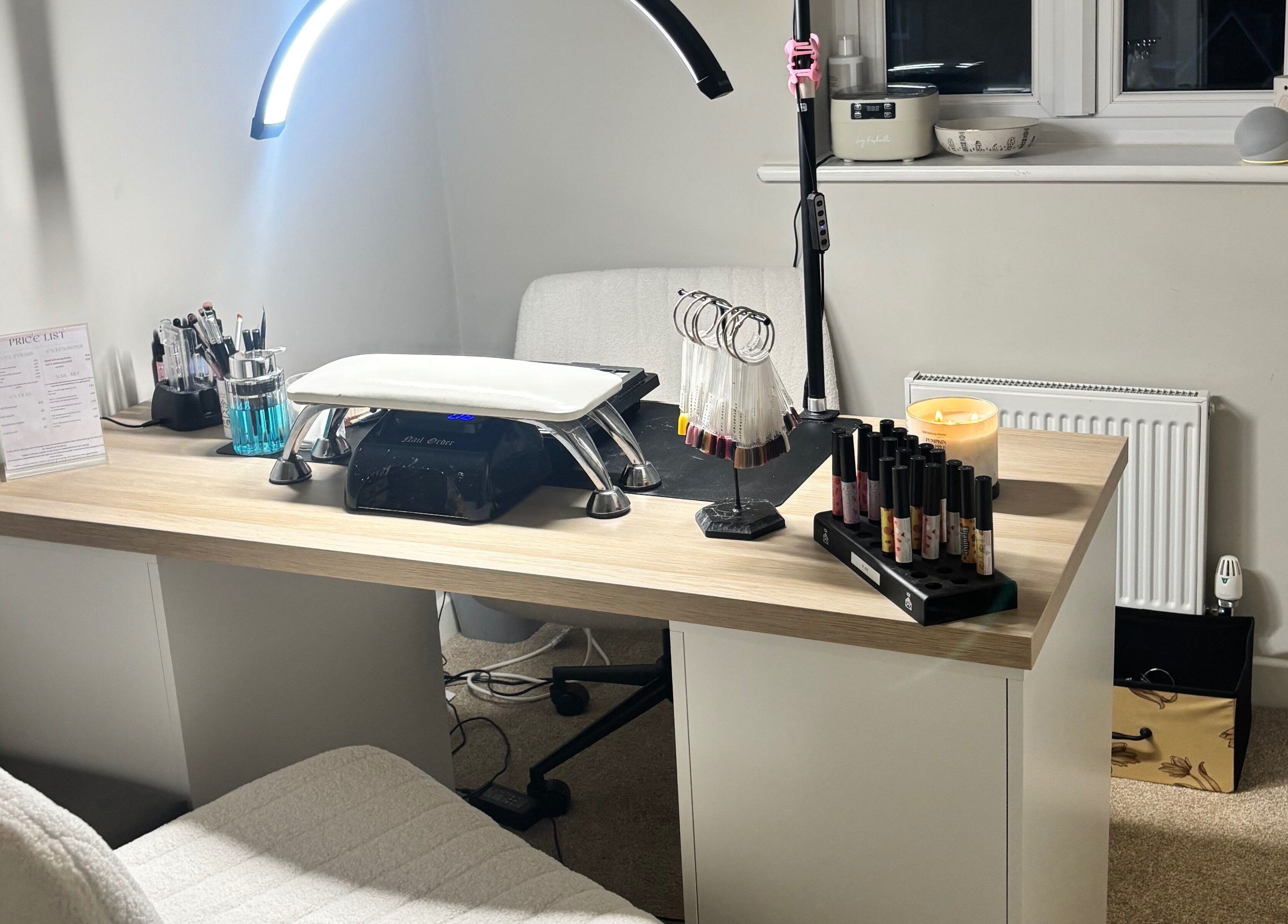 Modern nail station at nailsbyeloise, Great Blakenham, England, GB. Features polishes and tools for perfect care.