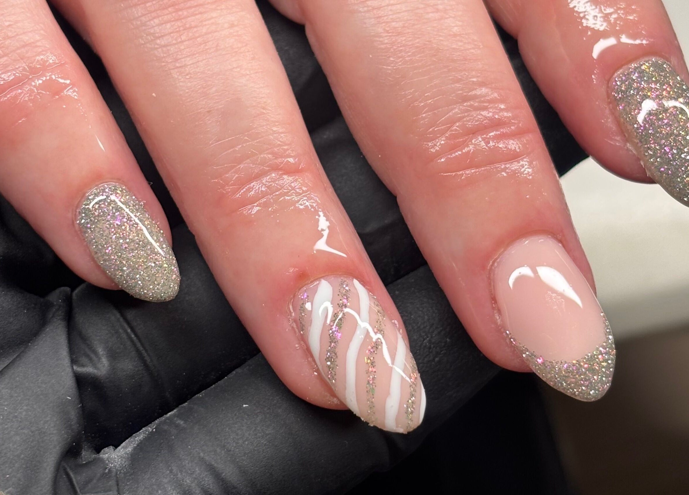 Glittery nail art design at nailsbyeloise, Great Blakenham, England, GB showcasing elegance and style.