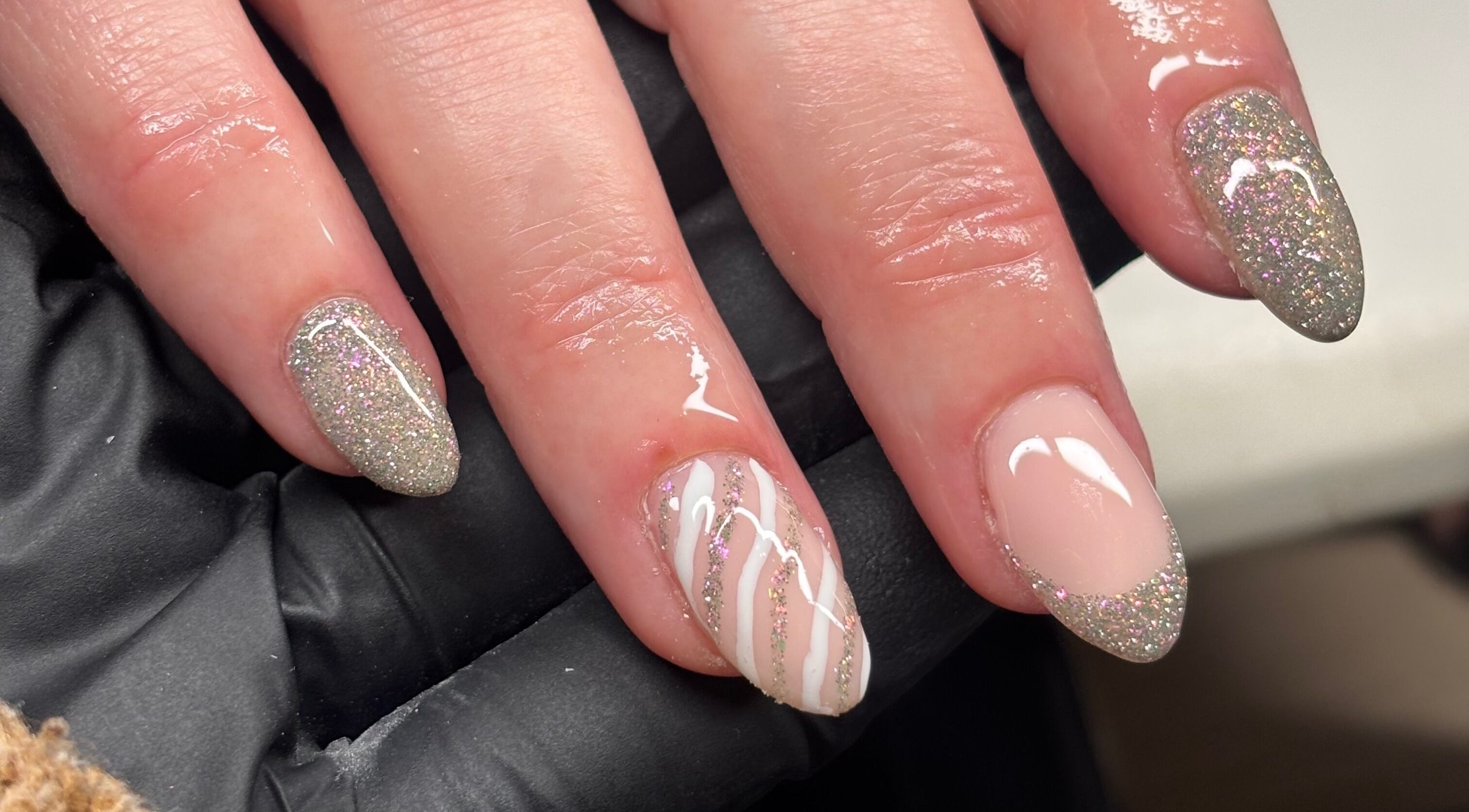 Glittery nail art design at nailsbyeloise, Great Blakenham, England, GB showcasing elegance and style.