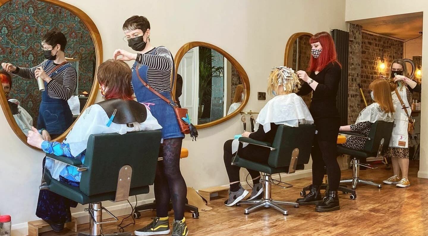 Stylists at work in Outline Hair, Edinburgh, Scotland GB, creating beautiful hair designs for clients.
