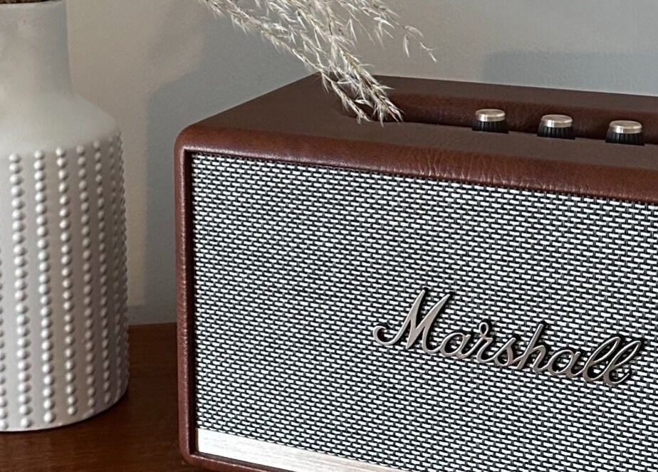 Stylish Marshall speaker next to decorative vase at Ruska, Poole, England, GB.