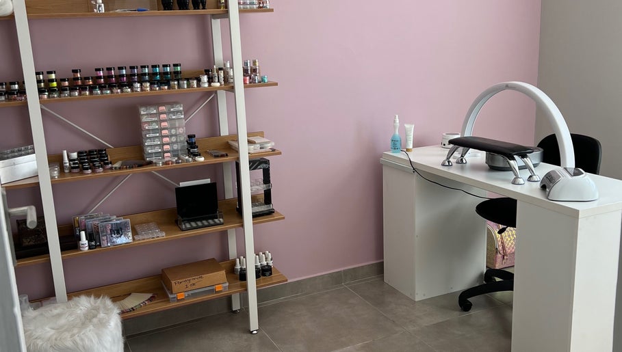 Hush Nail Scape in Cape Town, Western Cape, ZA showcases a chic nail studio with organized polish and modern nail station.