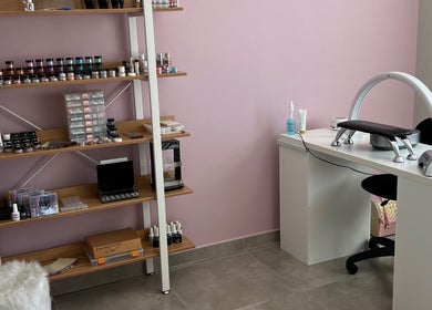 Hush Nail Scape in Cape Town, Western Cape, ZA showcases a chic nail studio with organized polish and modern nail station.
