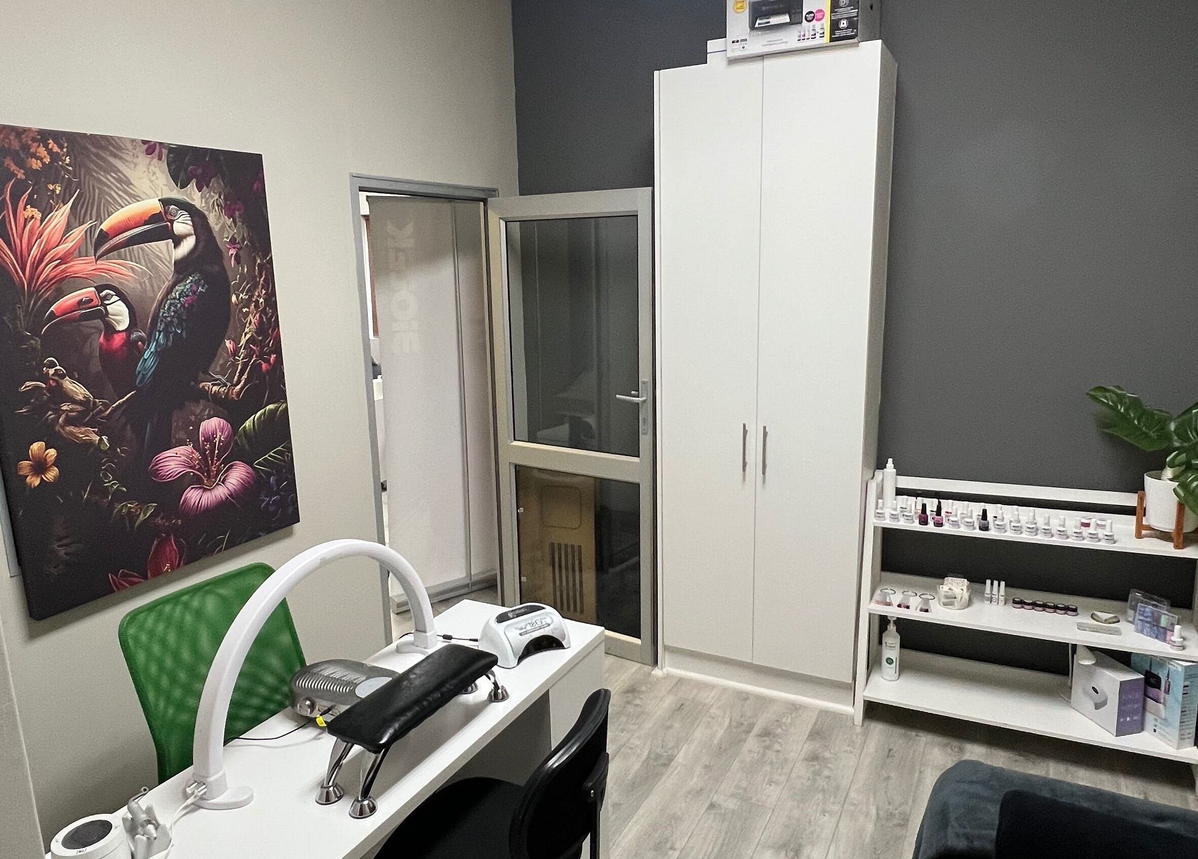 Sophisticated nail salon interior at Hush Nail Scape, Cape Town, Western Cape, ZA with tropical artwork.