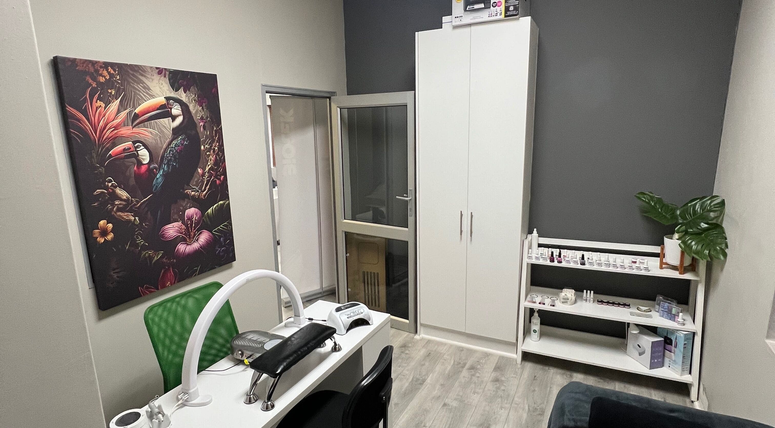 Sophisticated nail salon interior at Hush Nail Scape, Cape Town, Western Cape, ZA with tropical artwork.