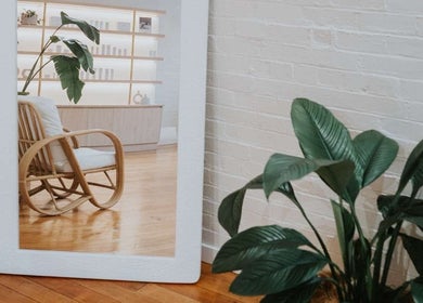 Elegant chair and plant reflected in mirror at Lomani Day Spa, Toowoomba City, Queensland, AU