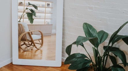 Elegant chair and plant reflected in mirror at Lomani Day Spa, Toowoomba City, Queensland, AU
