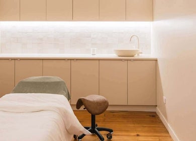 Tranquil treatment room at Lomani Day Spa, Toowoomba City, Queensland, AU featuring a massage table.