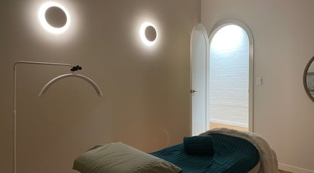 Serene massage room with warm lighting at Lomani Day Spa, Toowoomba City, Queensland, AU.