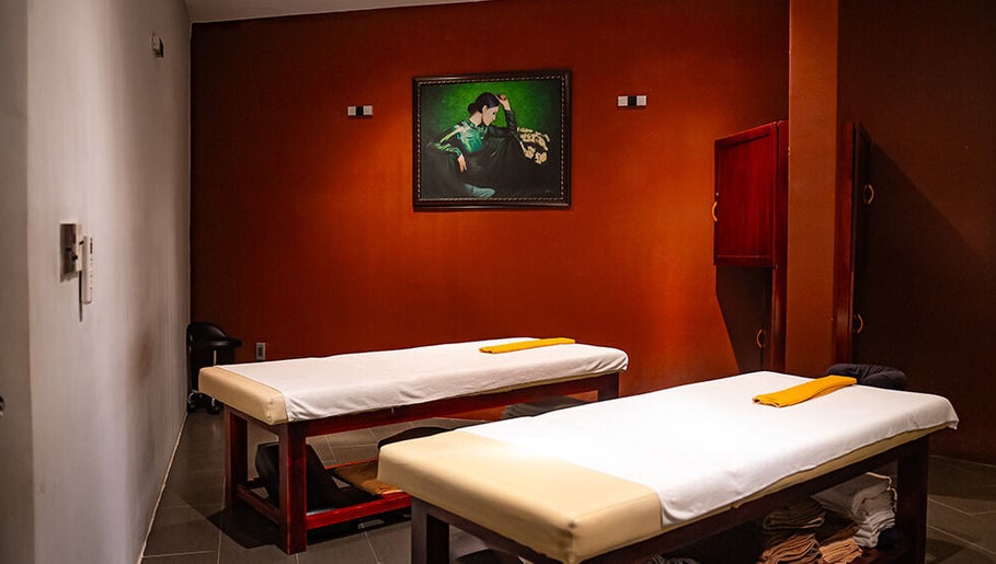 Relaxing massage room at Pure Vietnam Beauty and Spa, Thành phố Nha Trang, Khánh Hòa, VN with two massage tables.