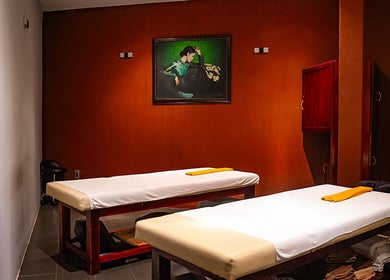 Relaxing massage room at Pure Vietnam Beauty and Spa, Thành phố Nha Trang, Khánh Hòa, VN with two massage tables.