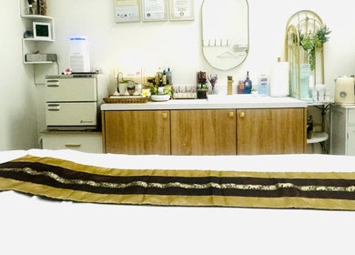 Relaxing massage room at Disara Thai Massage, Las Vegas, Nevada, US with elegant decor and soothing atmosphere.