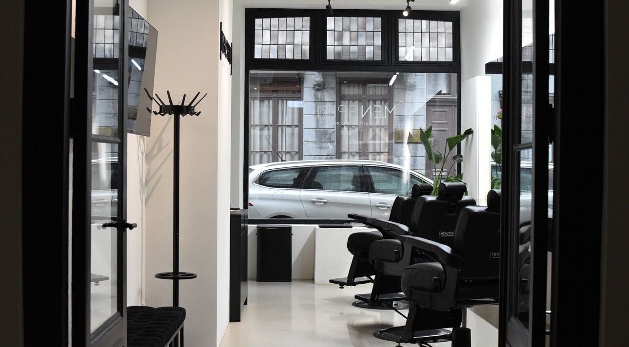 Interior of MENSPIRE Maastricht with sleek barber chairs at Maastricht, Limburg, NL.