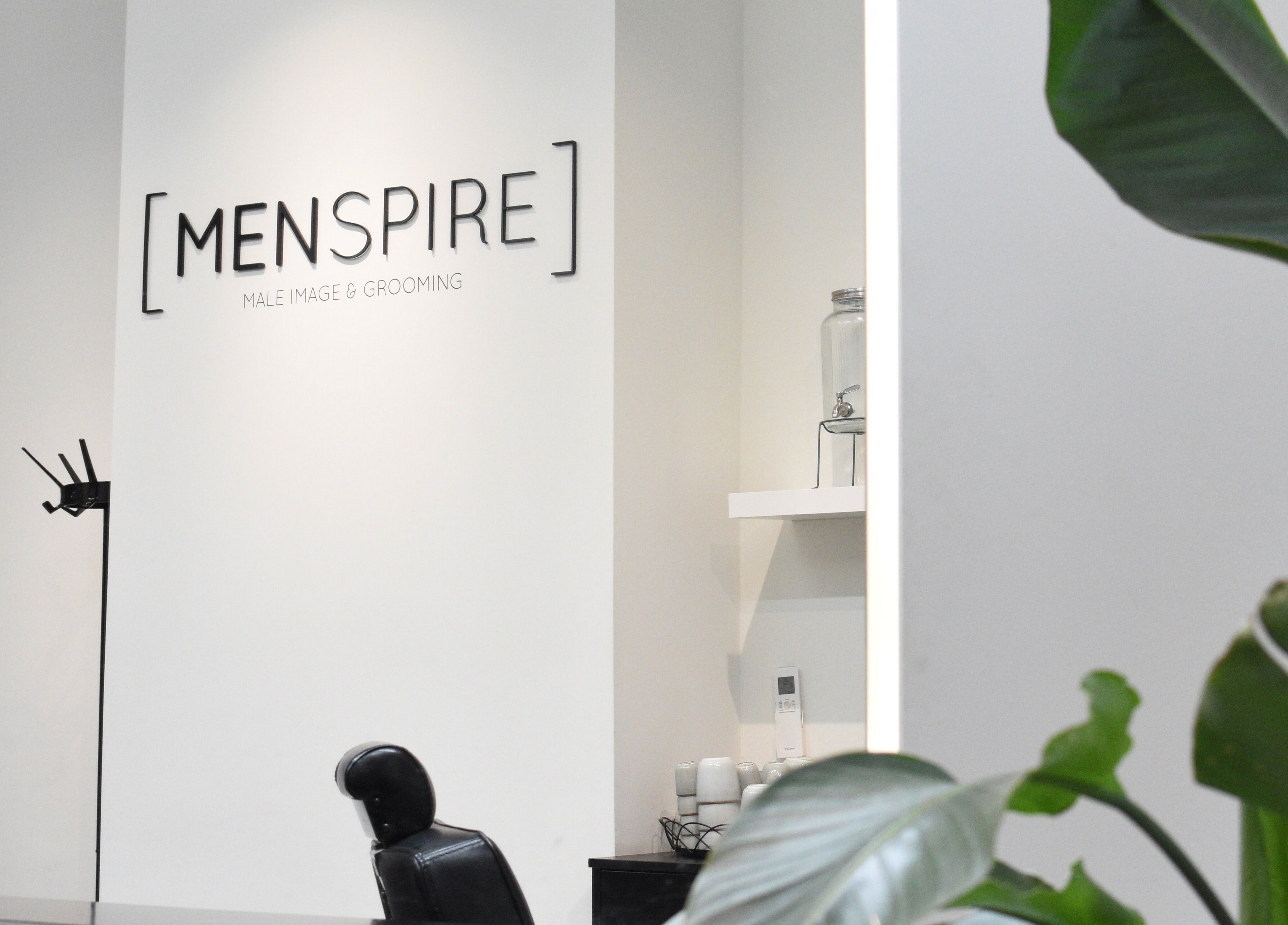 Interior of MENSPIRE Maastricht in Maastricht, Limburg, NL, showcasing sleek design with greenery.