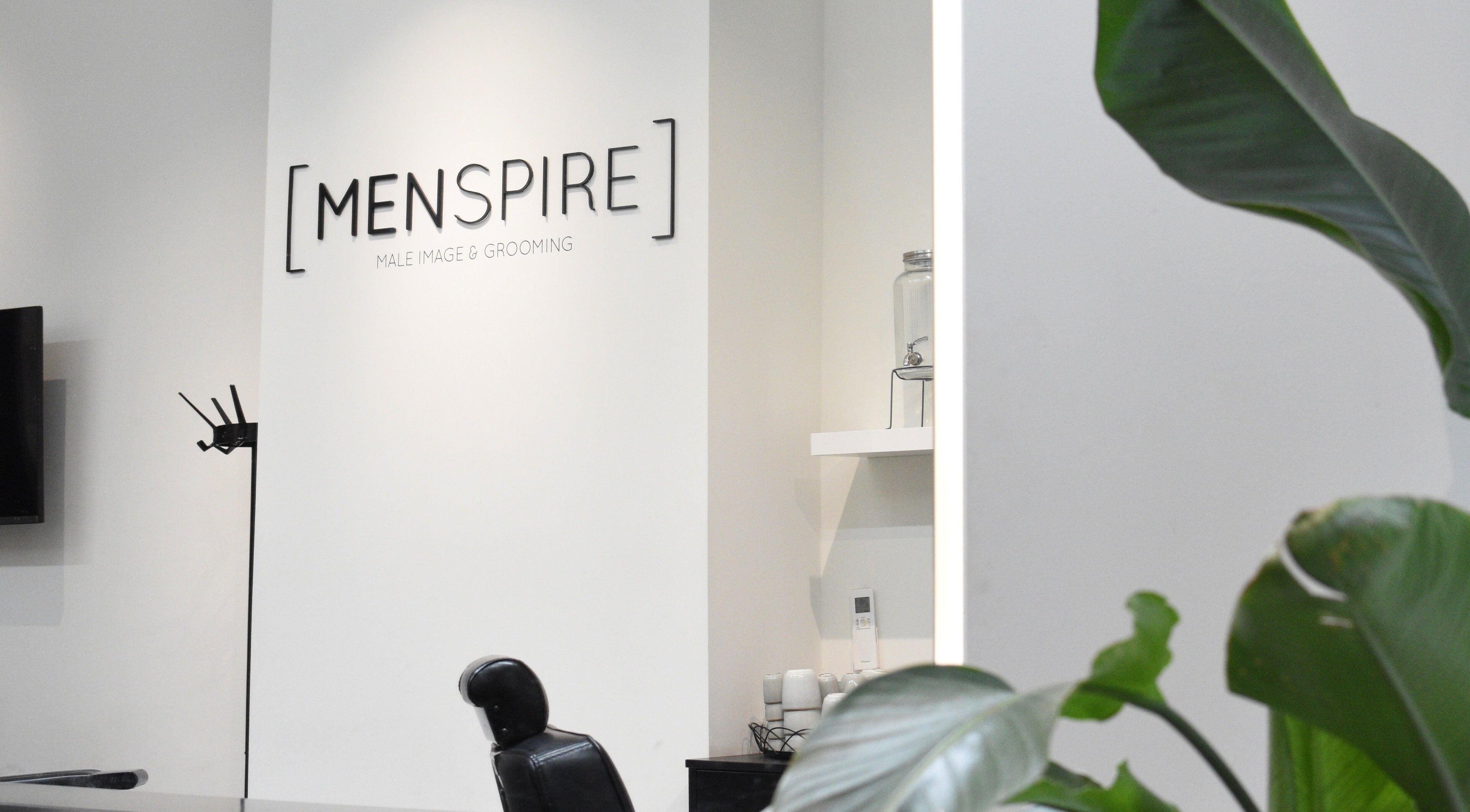 Interior of MENSPIRE Maastricht in Maastricht, Limburg, NL, showcasing sleek design with greenery.