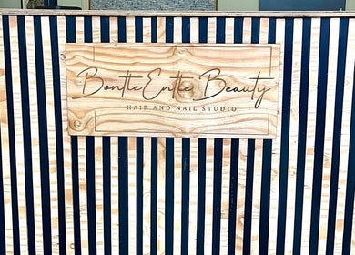 BontleEntle Beauty wooden sign at the Randburg, Gauteng, ZA entrance.