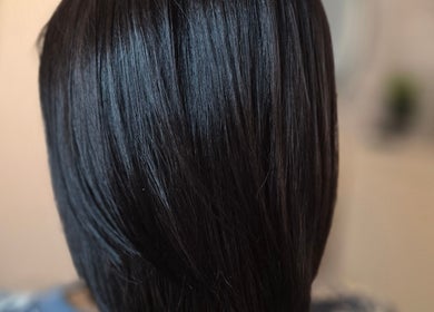Sleek black hair styled at JAIYA BEAUTÉ 🌸 Heidi in Montréal, Québec, CA, showcasing a perfect salon finish.