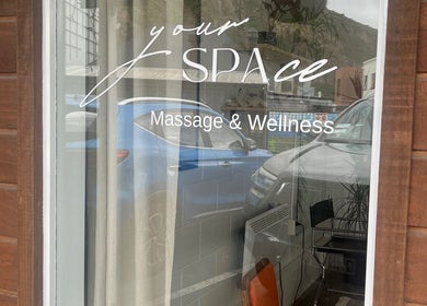 Entrance of yourSPAce Massage & Wellness in Christchurch, Canterbury Region, NZ with glass reflection.