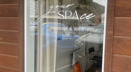 Entrance of yourSPAce Massage & Wellness in Christchurch, Canterbury Region, NZ with glass reflection.