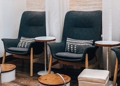Comfortable lounge chairs in Polished Spa, offering a relaxing atmosphere in Sharjah, AE.