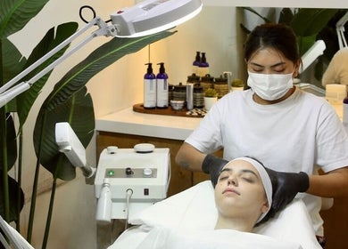 Relaxing facial treatment at Polished Spa, Sharjah, AE, showcasing serene wellness ambiance.
