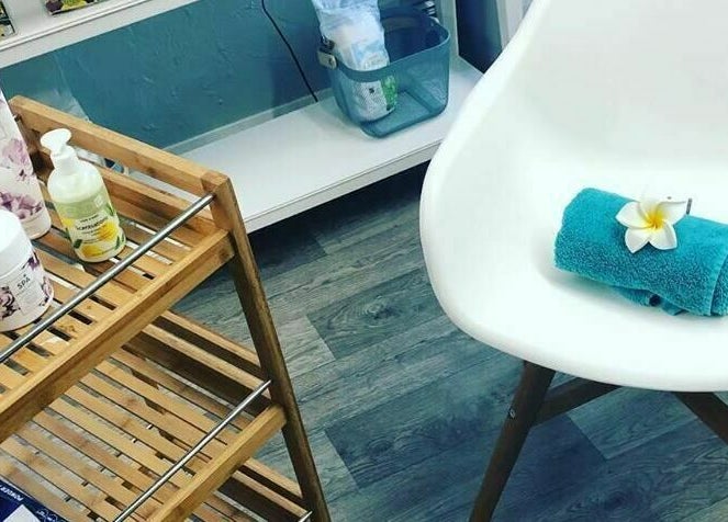 Relaxing spa setup with products and towel at Seaside Retreat, Peel, Peel, IM.