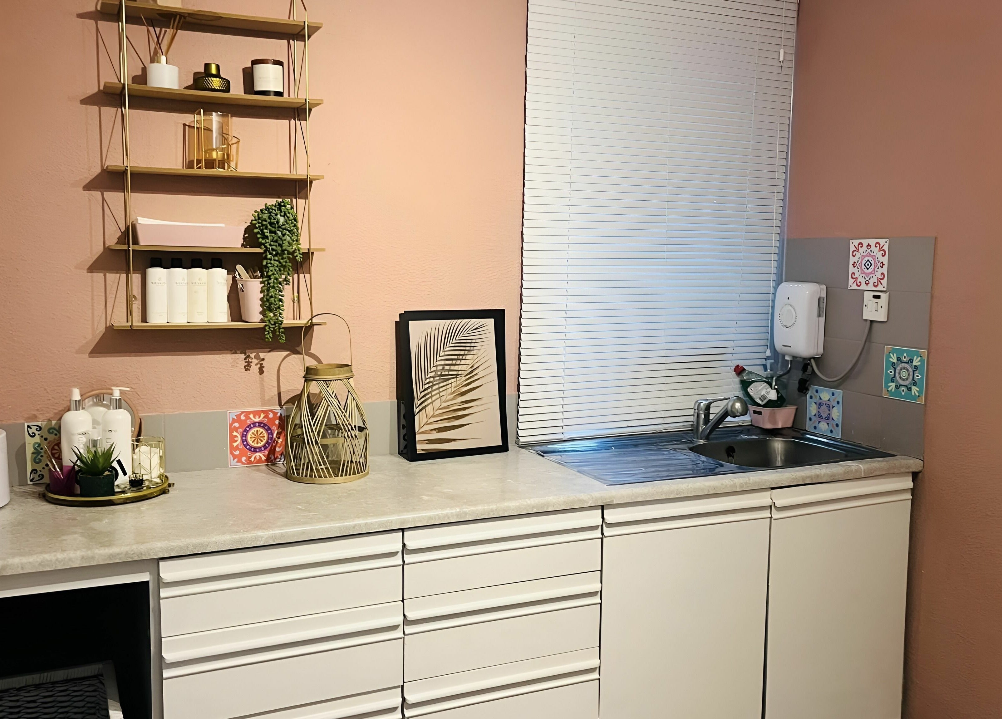 Stylish interior of Seaside Retreat in Peel, Peel, IM showcasing a cozy counter and decor.