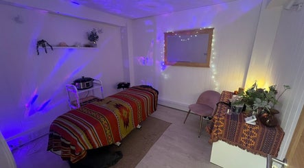 Relaxing massage room at The Massage Space, Winchester, England, GB with soft lighting and cozy decor.