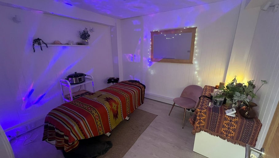 Tranquil massage room with ambient lighting at The Massage Space, Winchester, England, GB.