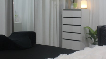 Eve Beauty Room massage bed and decor, Tuggerah, New South Wales, AU. Elegant and tranquil setting.