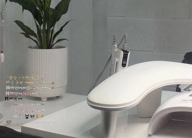 Eve Beauty Room in Tuggerah, New South Wales, AU features a stylish nail art station with tools and decor.