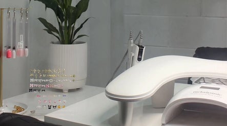 Eve Beauty Room in Tuggerah, New South Wales, AU features a stylish nail art station with tools and decor.