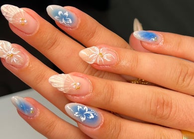 Exquisite floral nail art at Eve Beauty Room, Tuggerah, New South Wales, AU, showcasing intricate design.