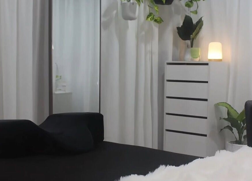Relaxing treatment room at Eve Studio, Tuggerah, New South Wales, AU with plush decor and soothing light.