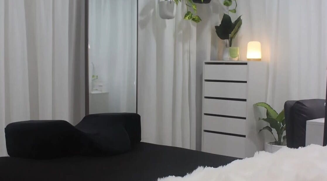 Relaxing treatment room at Eve Studio, Tuggerah, New South Wales, AU with plush decor and soothing light.