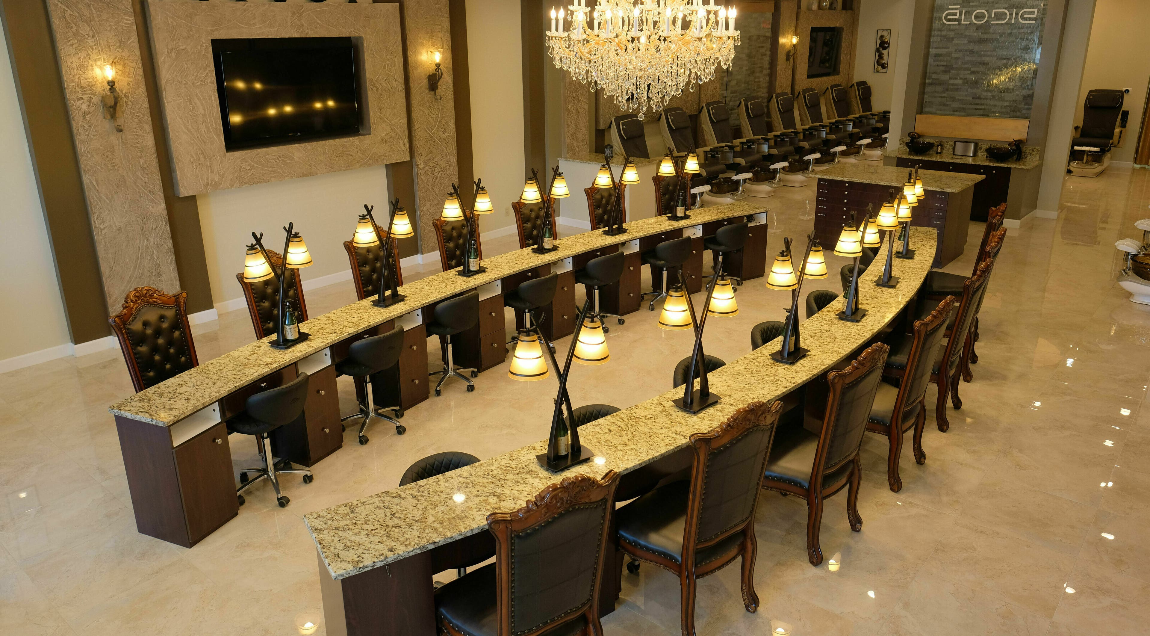 Luxury interior of Elodie | The Nail Lounge in Lewis Center, Ohio, US with elegant seating and chic decor.