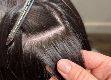 Close-up of hair treatment at Studio Choice in Richmond Hill, Ontario, CA showcasing sleek, shiny hair.