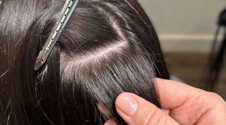 Close-up of hair treatment at Studio Choice in Richmond Hill, Ontario, CA showcasing sleek, shiny hair.