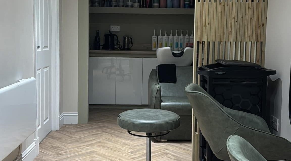Chic interior of The Hair Spa in Cowdenbeath, Scotland, GB featuring stylish seating and modern decor.