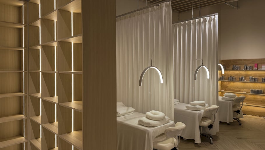 Tranquil spa treatment area at The Usual Lash in Darien, Connecticut, US with cozy reclining chairs and soft lighting.