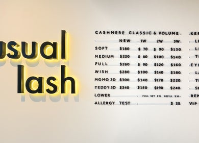 The Usual Lash pricing board in Darien, Connecticut, US displaying lash and brow services.