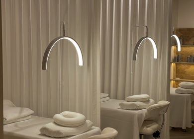Elegant treatment room at The Usual Lash, Darien, Connecticut, US showcasing cozy beds and soft lighting.