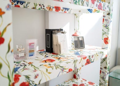 Floral shelves at Westport Lash in Westport, Connecticut, US showcasing beauty products.