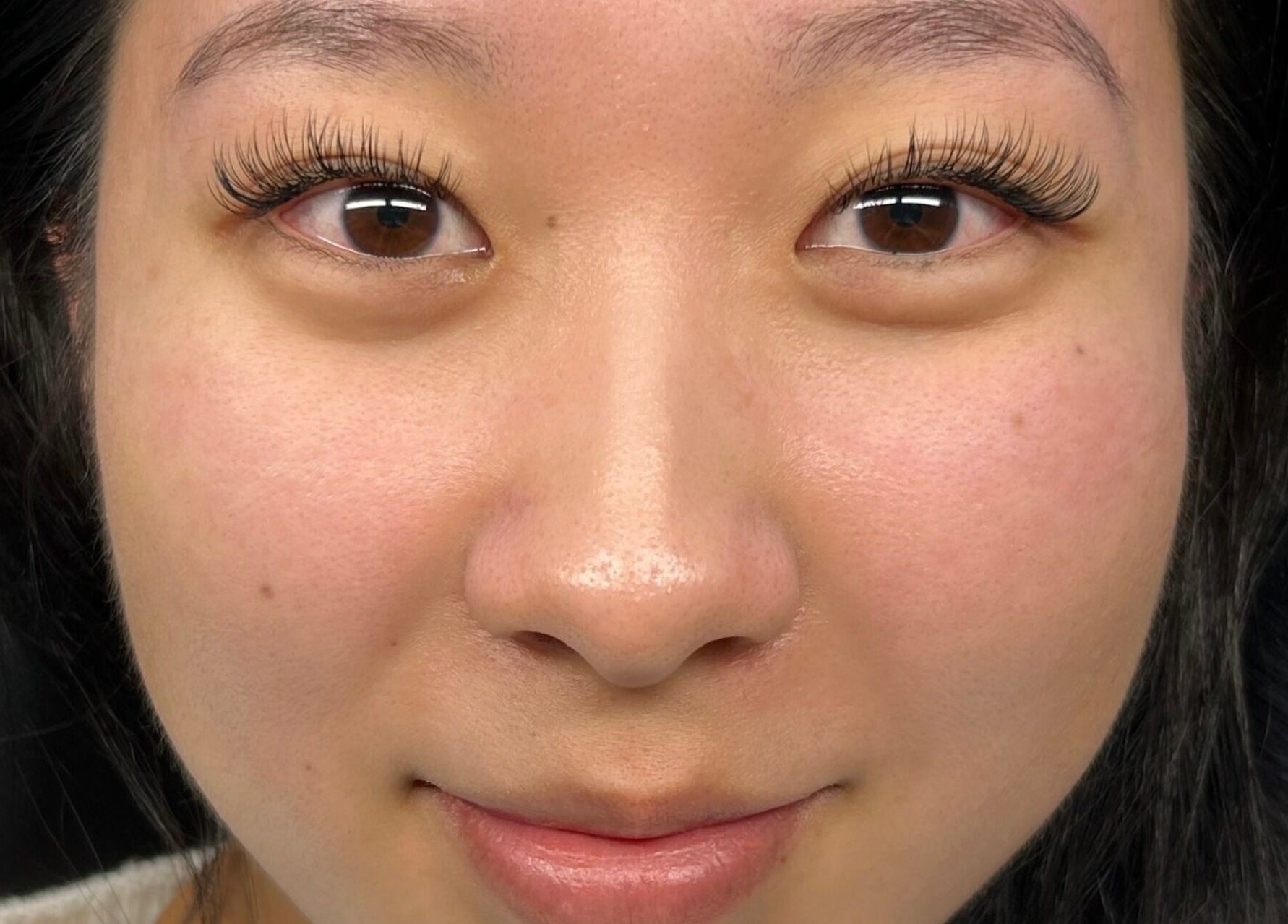 Close-up of eyelash extensions at CeLuxe Aesthetics, Southport, Queensland, AU showcasing precision beauty care.